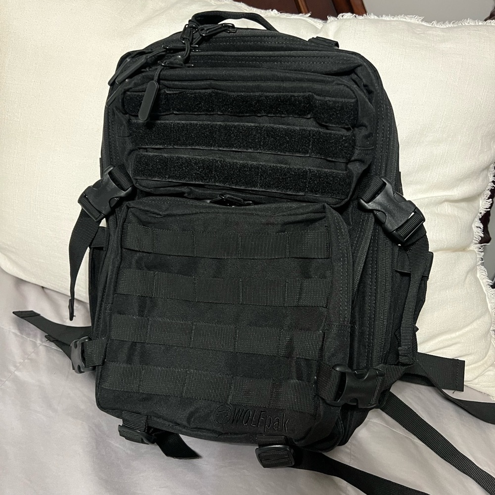 Wolfpak 35L backpack. NWT. Nonsmoking pet friendly house.